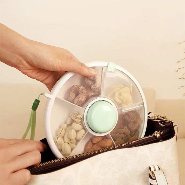Elegant roterende snacksfat med flere rom og tett lokk. Optimalt for familie og daglig bruk.
