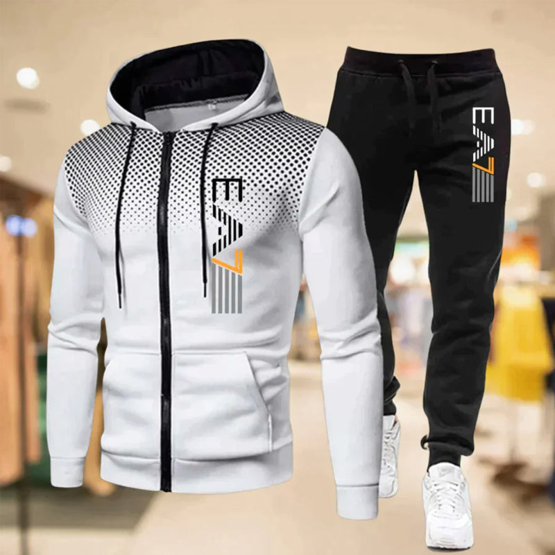 Menn i sporty joggebuksesett med glidelås. Perfekt for trening, turgåing eller avslappet hverdagsbruk.
