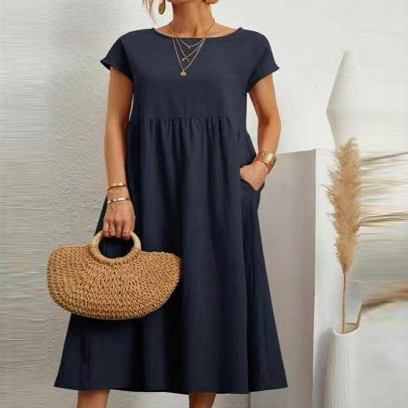 Elegant og komfortabel damekjole i bomullslin, lang ermeløs sommerstil med løs passform.
