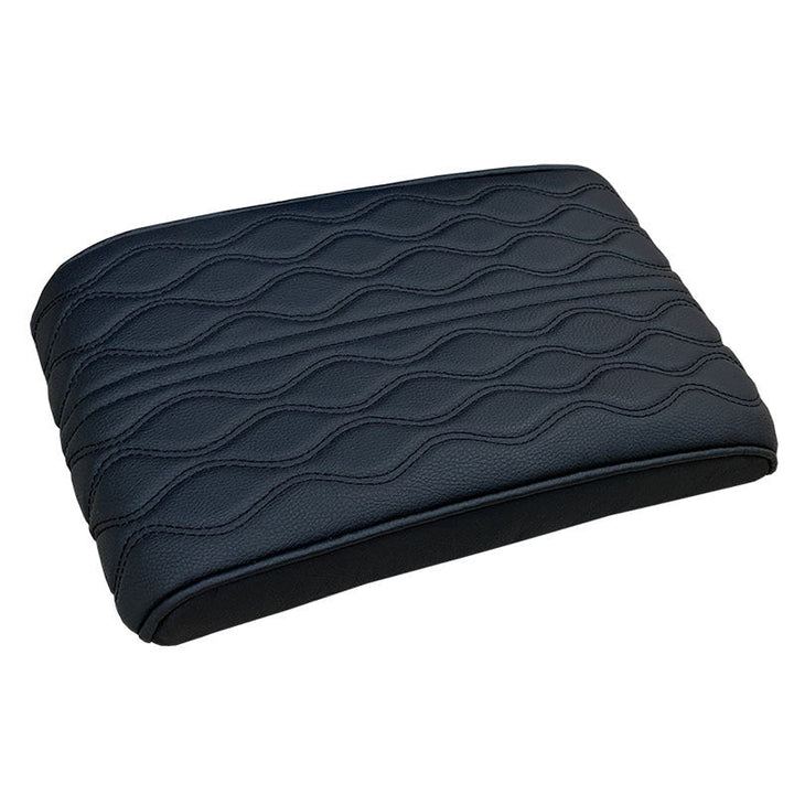 Slitesterkt mikrofiberskinn armlene med memory foam, beskytter konsollen og gir komfort.