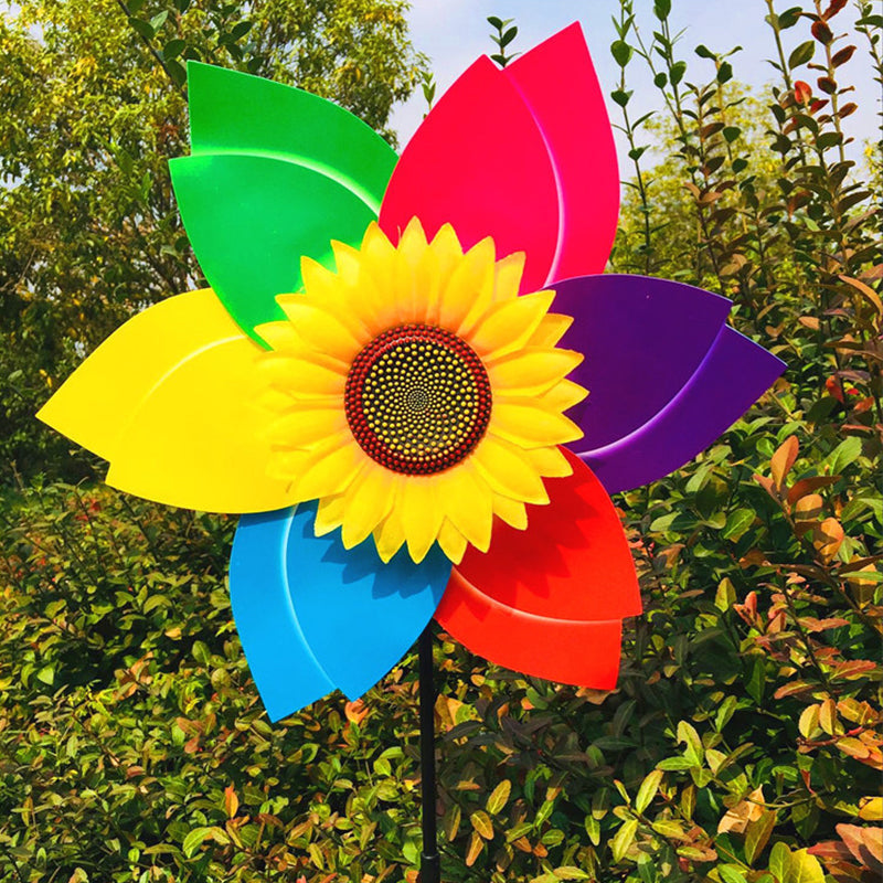 Hage solsikke vindmølle, fargerik, underholdende og en flott vindspinner.