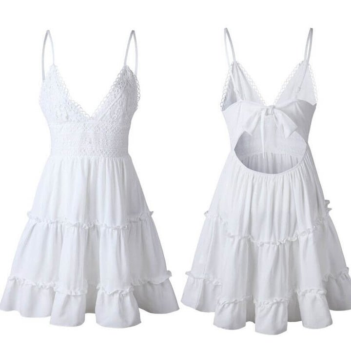 Elegant heklet V-hals sommerkjole for dame, perfekt for fest og varme dager. Komfortabel A-linje passform.