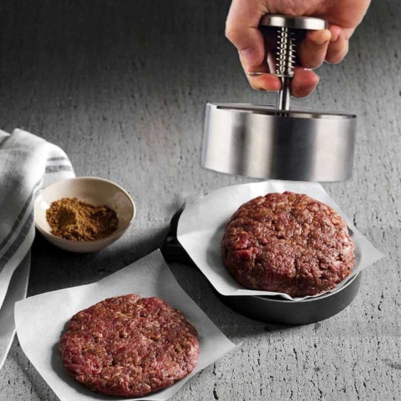 Manuell hamburgerpresse i rustfritt stål for å lage perfekte, jevne kjøttkaker til grill og matlaging.