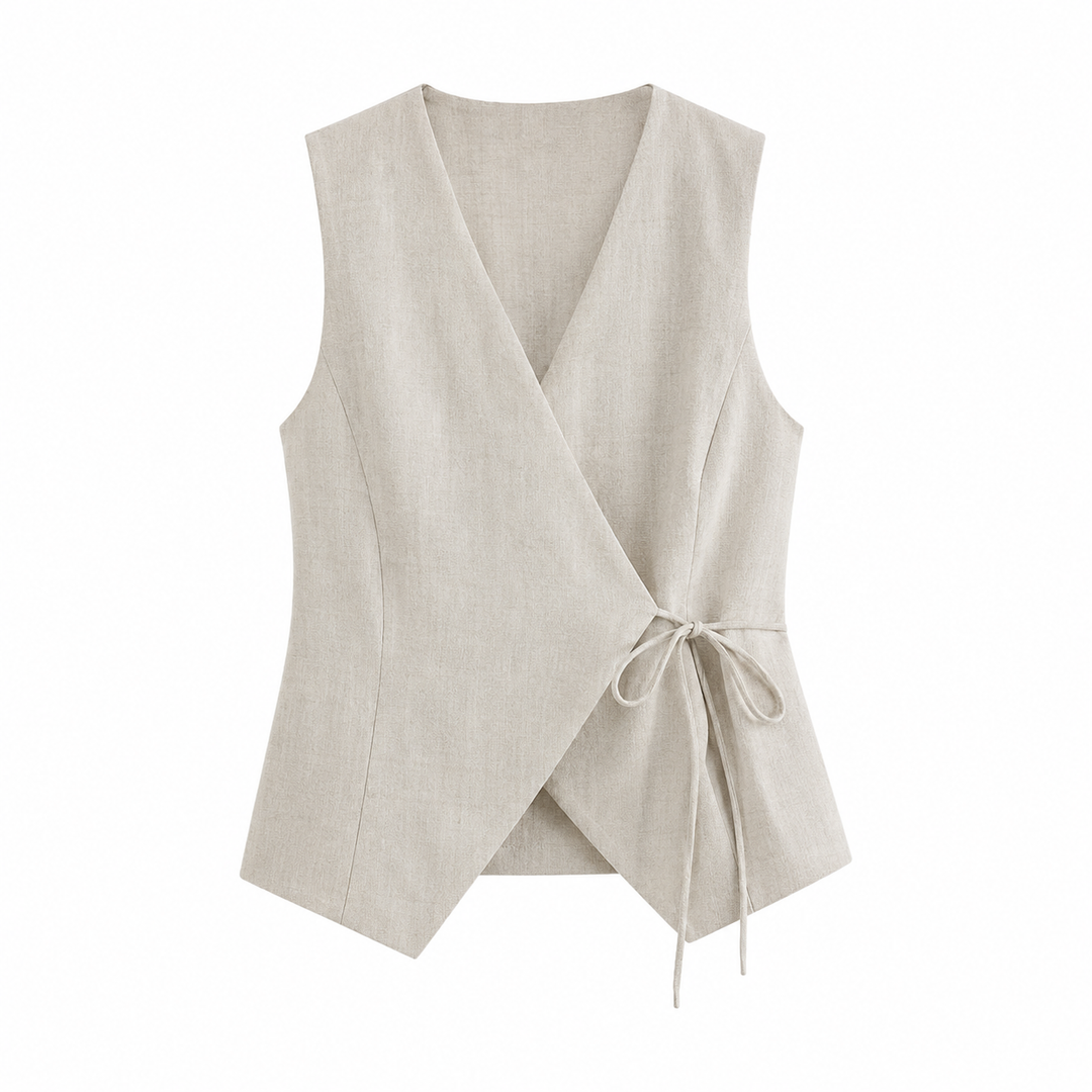 Elegant dame vesttopp med V-hals og knytedetalj. Allround vintage stil for casual og elegant bruk.