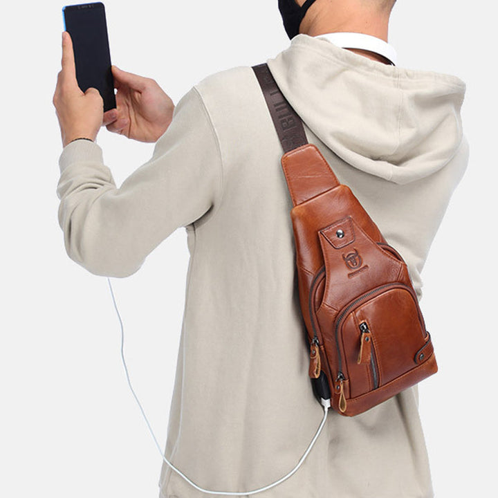 Rødbrun skinnveske cross-body for menn, vanntett og romslig fritidsveske.