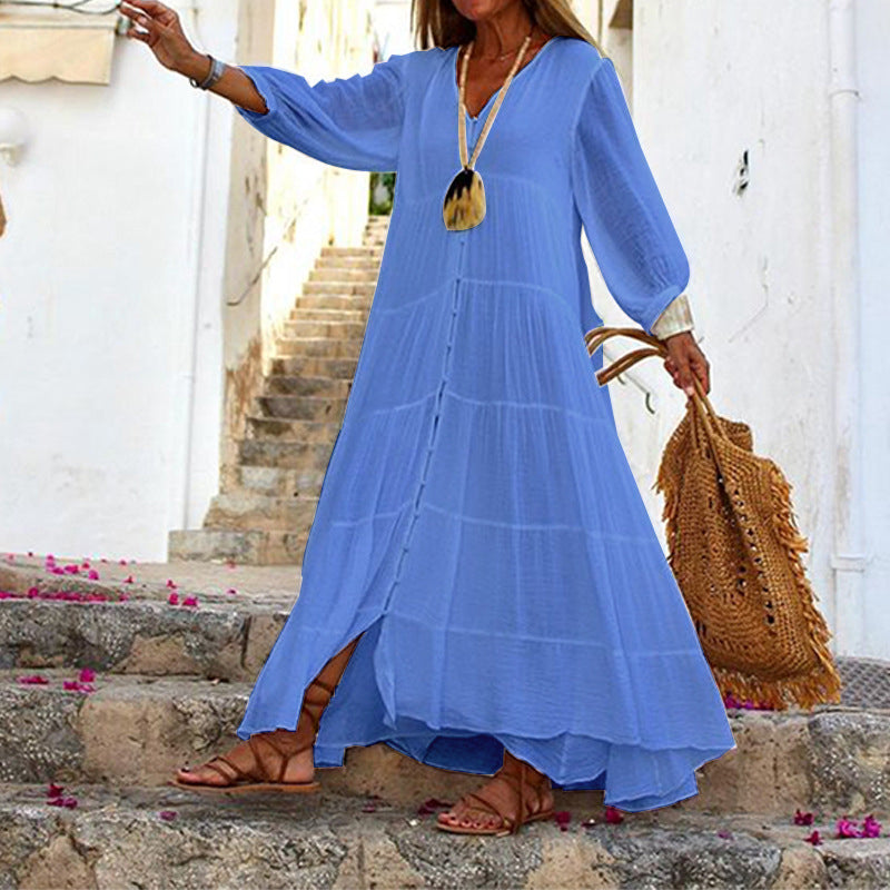 Boho-inspirert ensfarget maxikjole til dame, med flatterende V-hals og lange ermer for elegant stil.