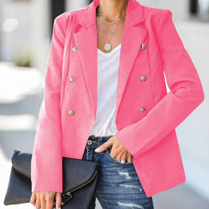 Elegant ensfarget dameblazer i klassisk design, med knapper, perfekt for formelle anledninger.