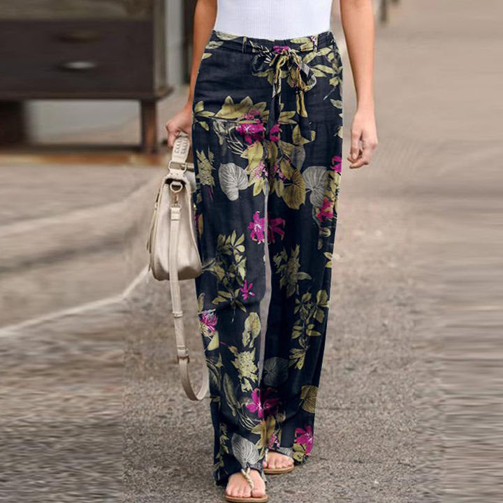 Trendy mønstrede damebukser med elastisk midje og rett passform, flott for en casual outfit.