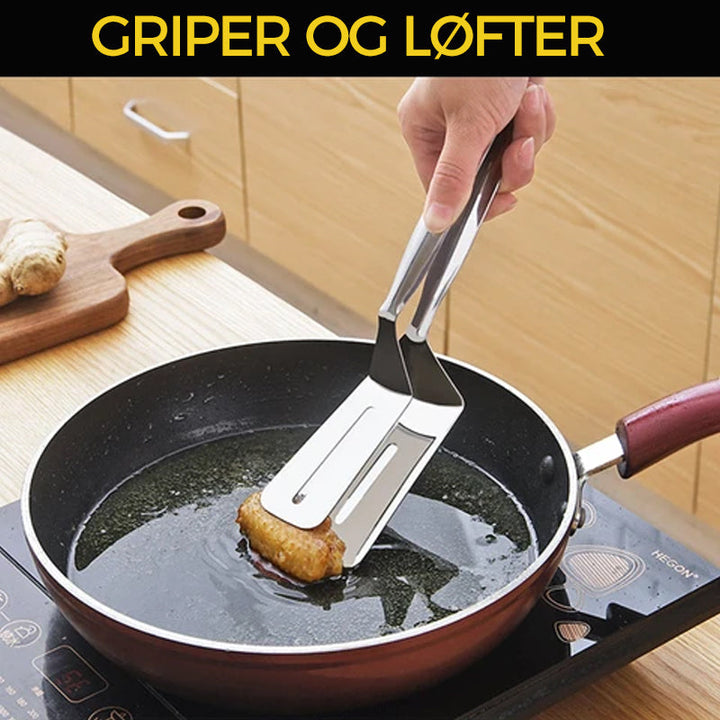 Sølvfarget dobbeltsidig stekespade-klype i rustfritt stål. Perfekt for pannekaker og fisk.