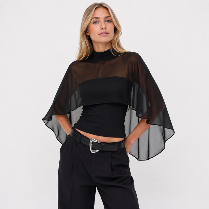 Svart bandeau topp til dame med elegant sjaldetalj, ermeløs og figurnær passform, perfekt for fest og sommer.