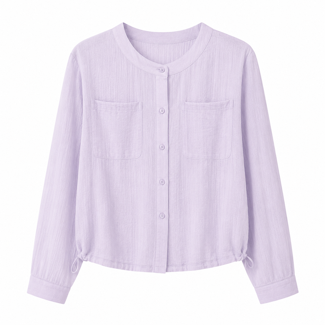 Elegant oversized dametopp med lange ermer og rund hals. Luftig, transparent stoff perfekt for casual sommerstil.