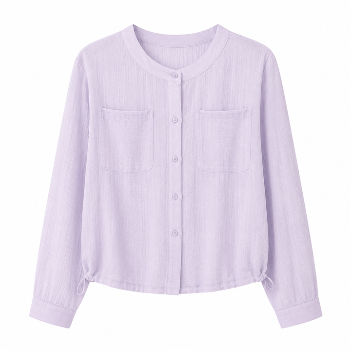 Elegant oversized dametopp med lange ermer og rund hals. Luftig, transparent stoff perfekt for casual sommerstil.