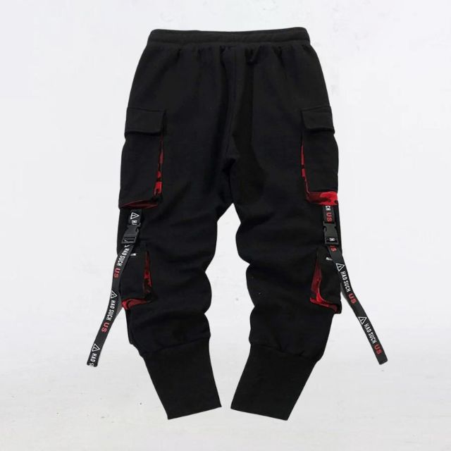 Nærbilde av sorte stropper og snøring på komfortabel unisex joggebukse.