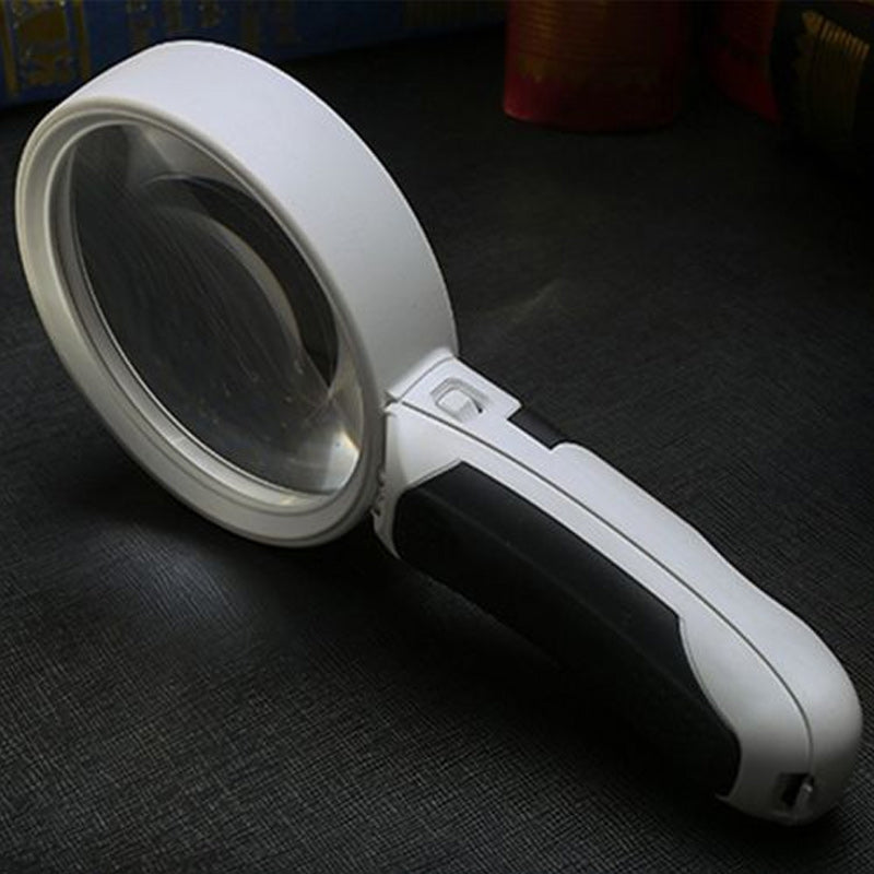 Effektivt synshjelpemiddel: 20x forstørrelsesglass med LED-lys for skarpe detaljer.