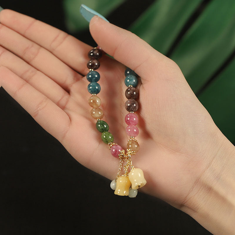 Elegant fargerikt turmalin armbånd. Tidløst naturstein smykke som fremhever stil.