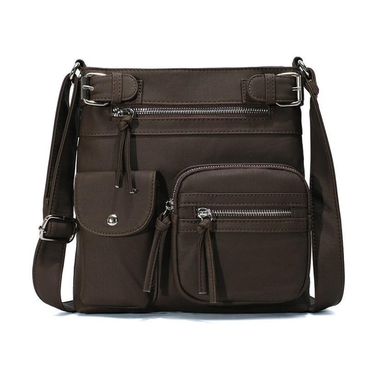Slitesterk vanntett dameveske i PU-lær, en robust crossbody for langvarig bruk og beskyttelse av innhold.
