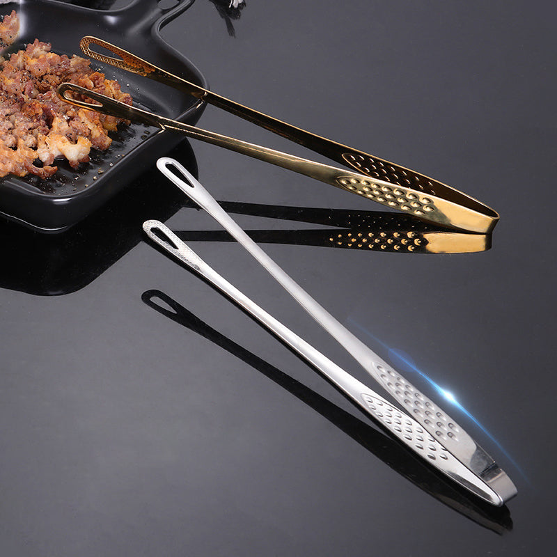 Ergonomisk grilltang i rustfritt stål, komfortabel for lange grilløkter og matlaging.