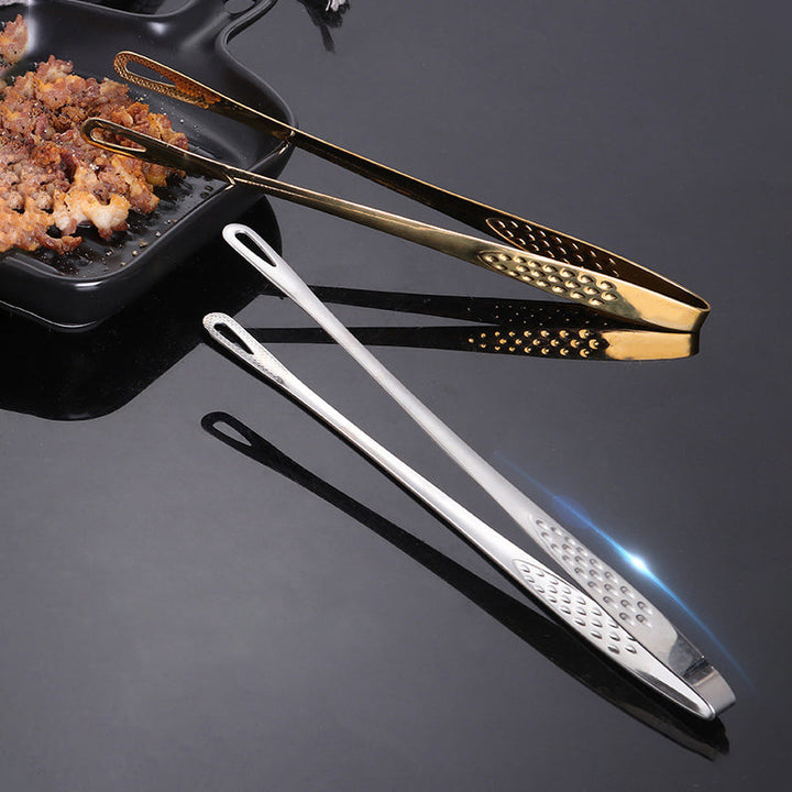 Ergonomisk grilltang i rustfritt stål, komfortabel for lange grilløkter og matlaging.