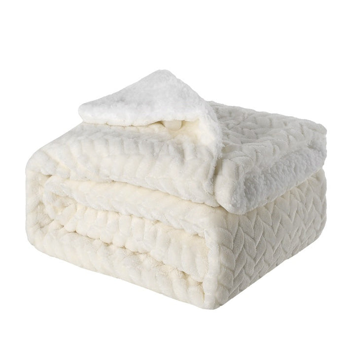 Detalj av det myke microfiberpleddets rike tekstur og varme farge, perfekt for hjemmehygge.