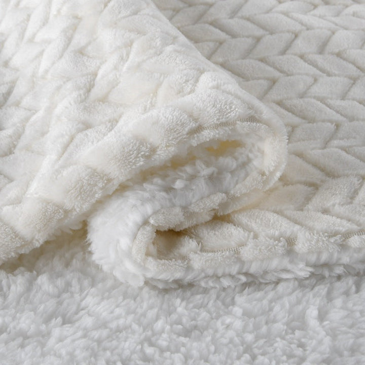 Fluffy og komfortabelt microfiberpledd, gir luksuriøs varme og mykhet som et koselig teppe.