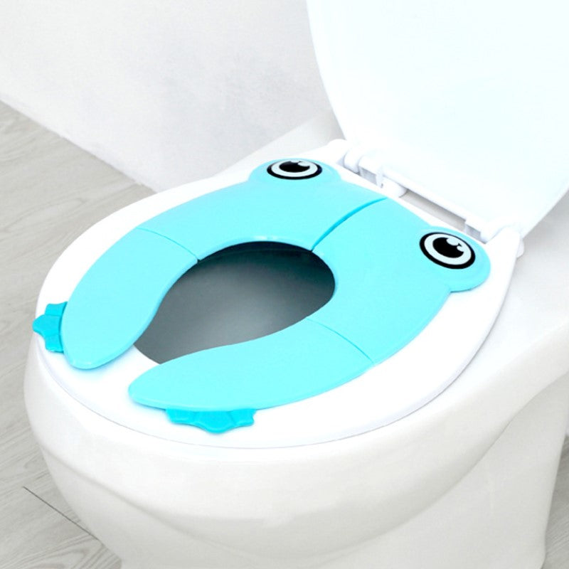 Lett å rengjøre sammenleggbart toalettsete for barn. Ideelt for reise og god hygiene.