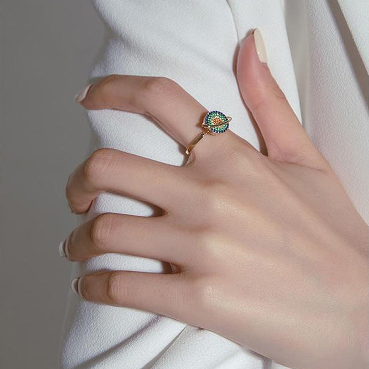 Beroligende spinnende galakse ring i justerbar design med glitrende zirkon. En vakker angstdempende fidgetring.