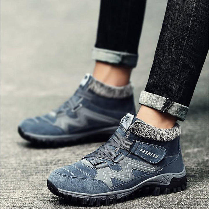 Unisex vinterfottøy med borrelås, tilbyr lettvint på/av og solid varme.