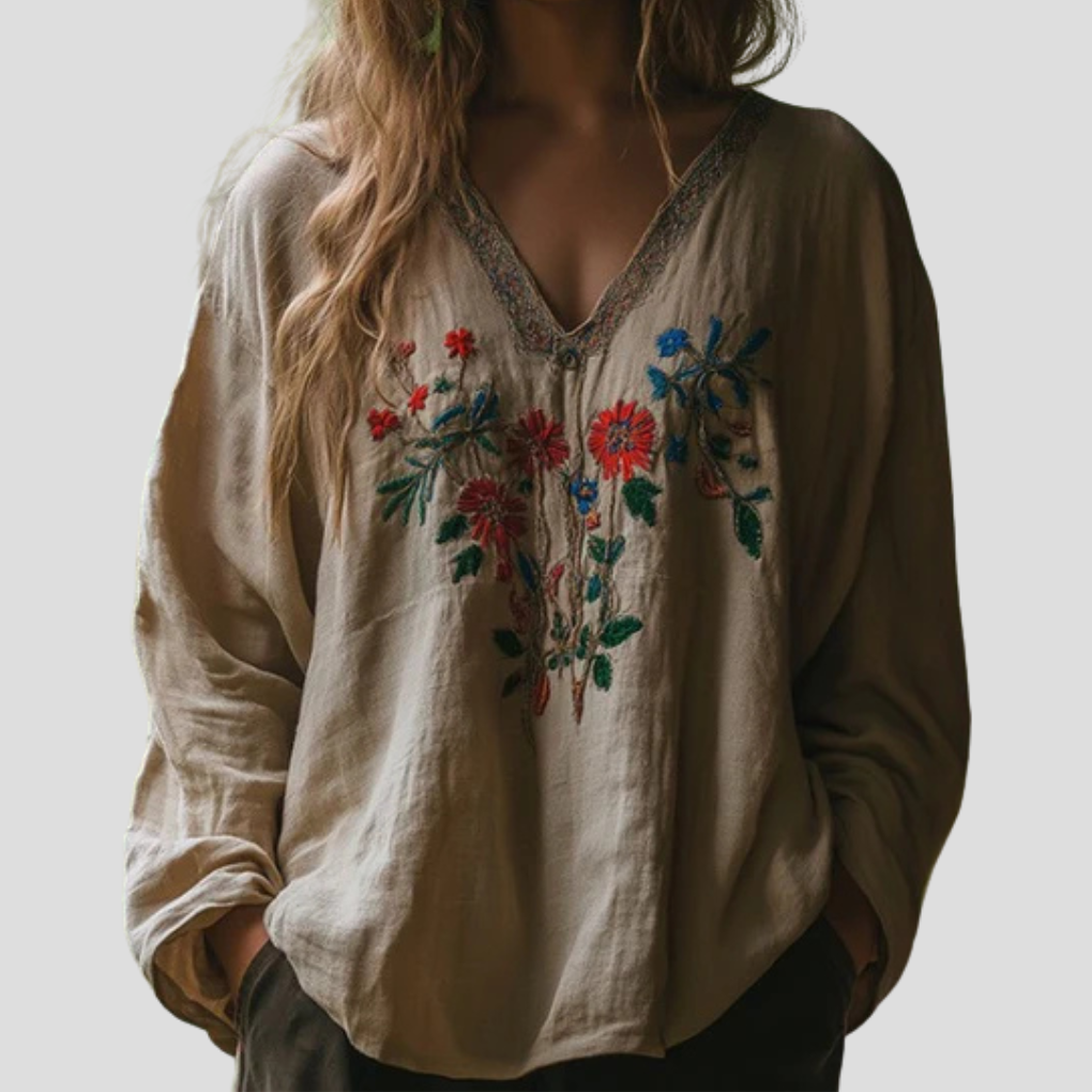 Elegant brodert bluse for kvinner, perfekt for hverdag og fest. Allsidig langermet damebluse i klassisk design.