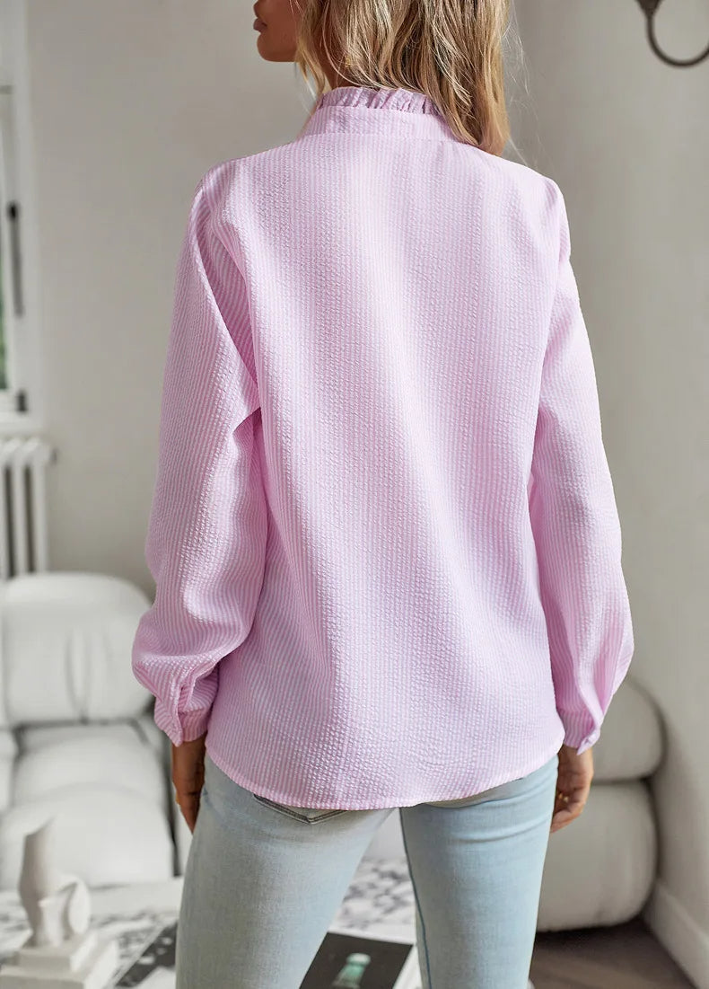 Elegant og komfortabel Della bluse, perfekt topp for den motebevisste kvinnen.
