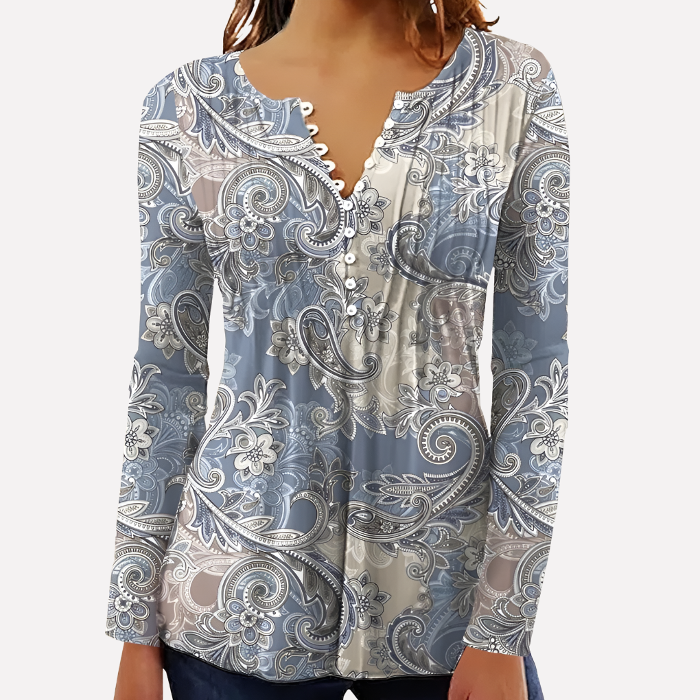 Lett og elegant kvinnetopp, ideell for sommerdager og varmere vær. Komfortabel bluse.