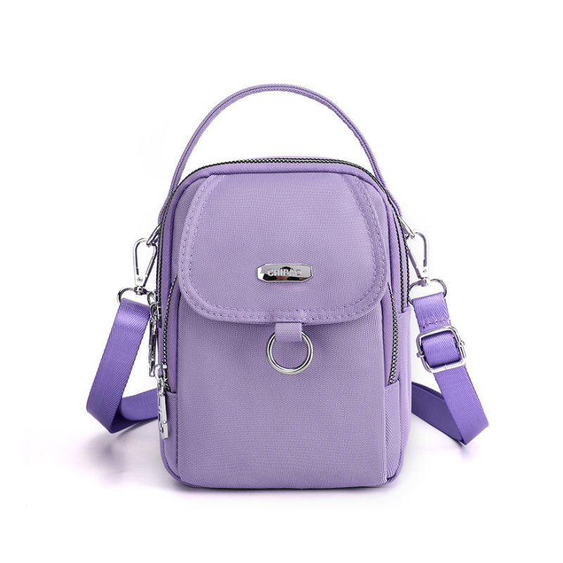 Funksjonell vanntett nylonveske. Crossbody eller skulderveske, perfekt for en aktiv hverdag.