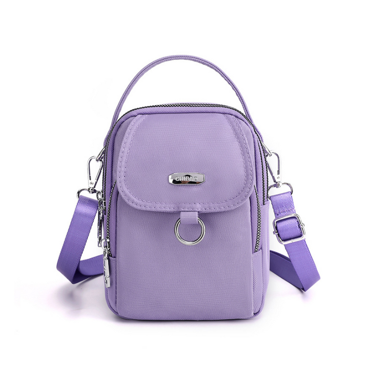 Funksjonell vanntett nylonveske. Crossbody eller skulderveske, perfekt for en aktiv hverdag.