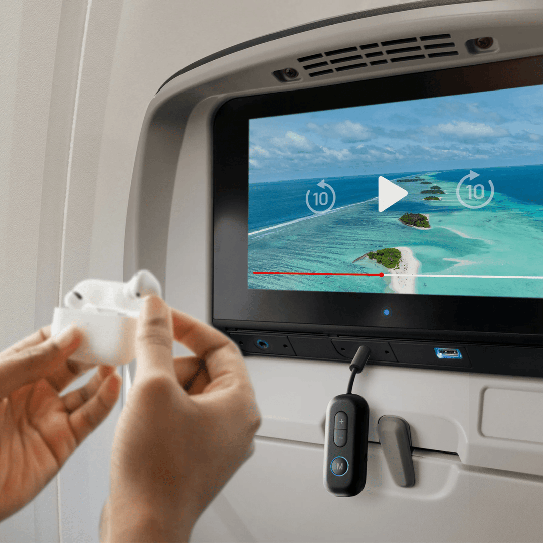 Kompakt universal Bluetooth lydadapter for reise. Nyt trådløs lyd med dine egne hodetelefoner på fly og tog.