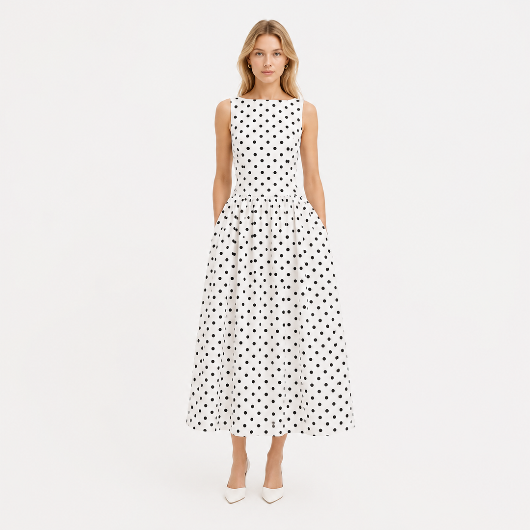 Elegant prikkete maxikjole til dame. Ermeløs sommerkjole med høy midje, perfekt for fest eller hverdag.