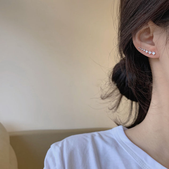 Elegante syvstjerne krystalløredobber for dame; glitrende smykker, allergivennlig.