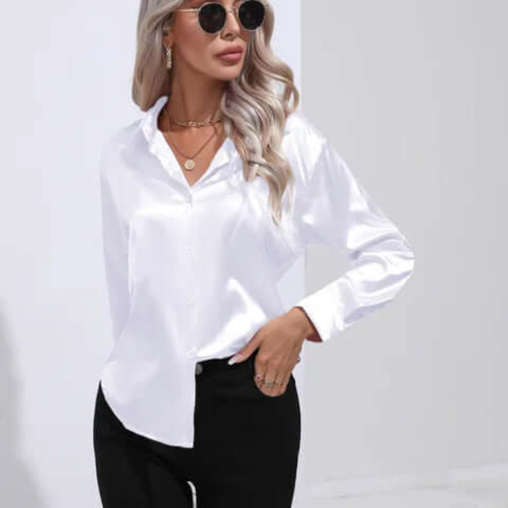 Chic løs damebluse med lange ermer; elegant og allsidig for moderne kvinner.