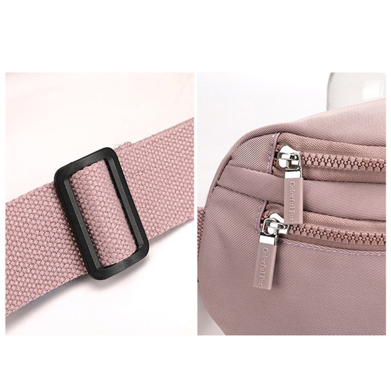 Midjeveske med flere rom til dame, organisert oppbevaring, moderne og sporty stil.