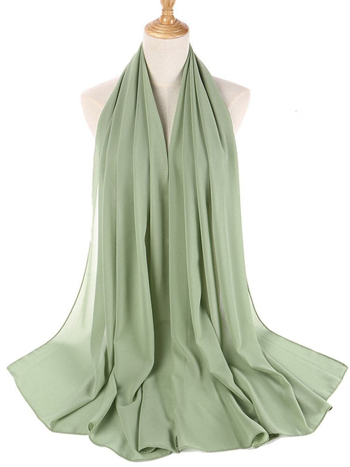 Mykt og behagelig chiffon sjal, gir en grasiøs silhuett.