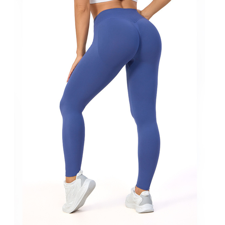 Komfortable athleisure-bukser for kvinner med høyt liv, gir støtte og fleksibilitet for sport og fritid.
