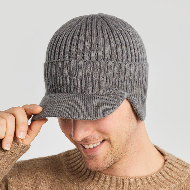Unisex varm strikket lue med ørebeskyttelse i akryl, perfekt for vinter og utendørs aktiviteter.