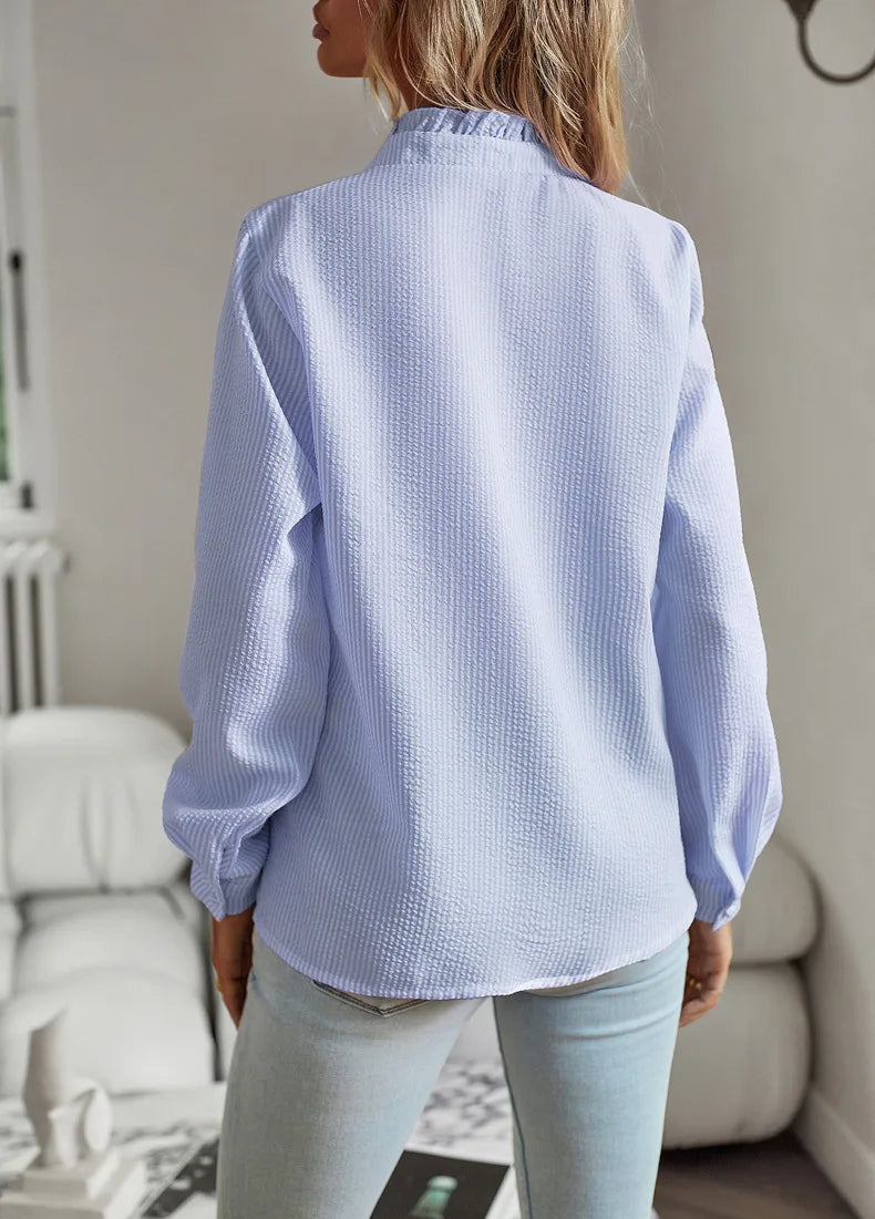 Komfortabel Della bluse, elegant festtopp for kvinner, tidløs mote.