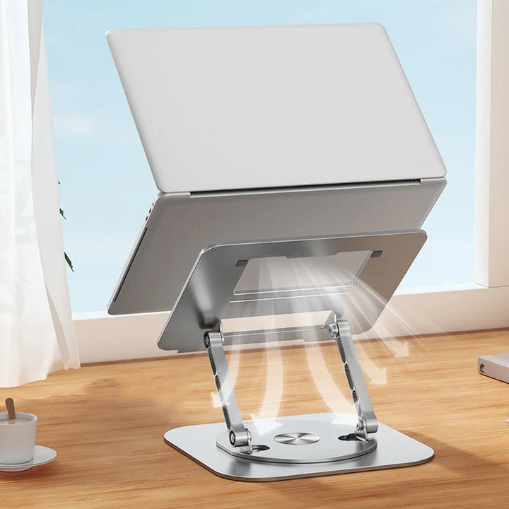 Robust roterende aluminium laptop holder. Essensielt kontorutstyr for bedre holdning og komfort.