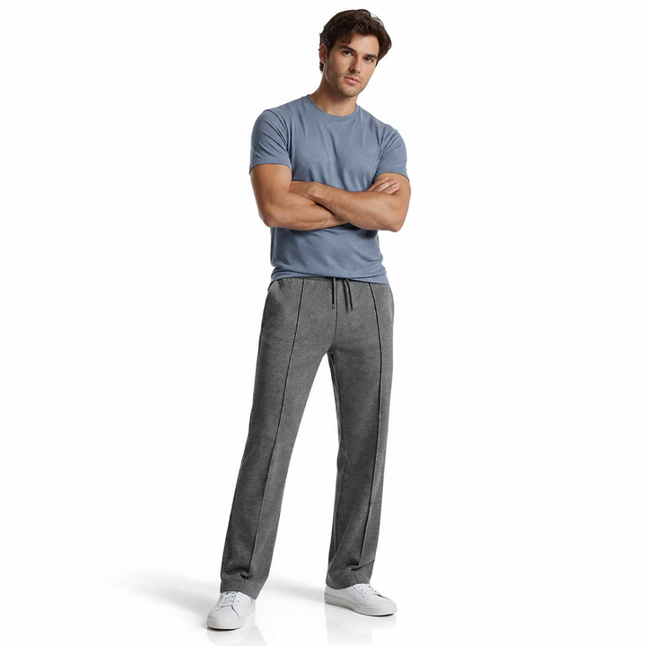Menns vide joggebukser i mørk grå, perfekte for sporty hverdagsstil.