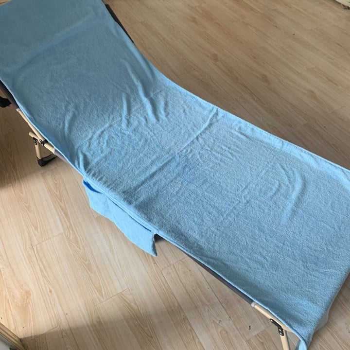 Dame liggepute med praktisk ryggstøtte, gir komfortabel soling og avslapning i hagen.