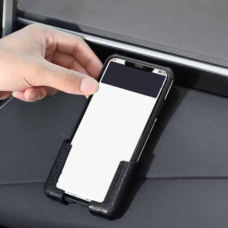 Universell selvklebende telefonholder i bil, sikker montering på dashbord for smarttelefon.