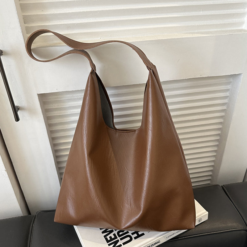 Kaffe farget skulderveske i vestlig stil, ensfarget og minimalistisk elegant for damer.