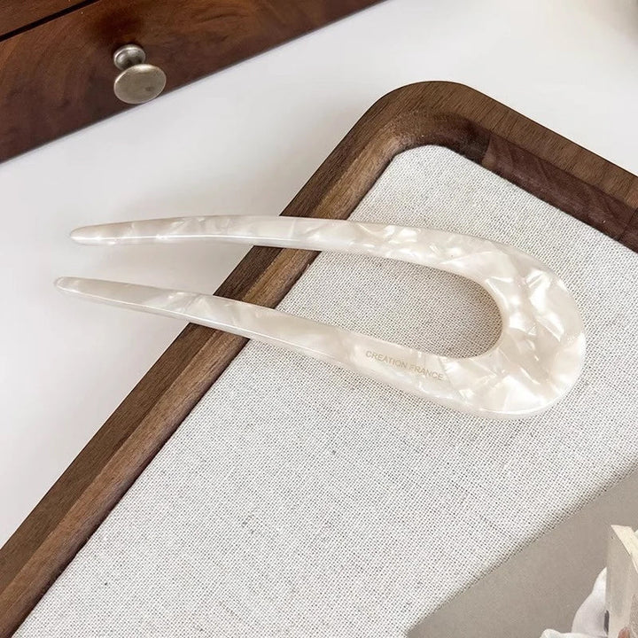 Trendy U-formet hårnål, det ultimate akryl tilbehøret for moderne og elegant hårstyling.