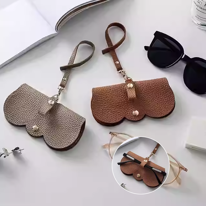 Unisex PU-skinn solbrilleveske for beskyttende oppbevaring på reise. Elegant og kompakt.