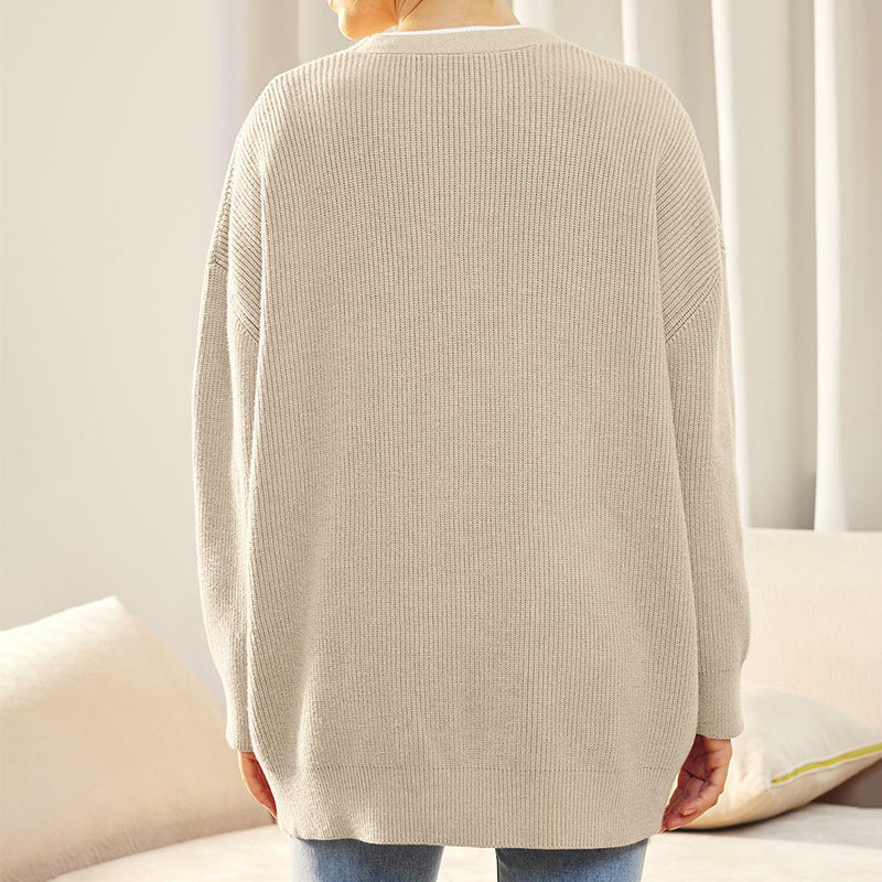 Langermet cardigan for kvinner, ensfarget og perfekt som vår- eller høstjakke.