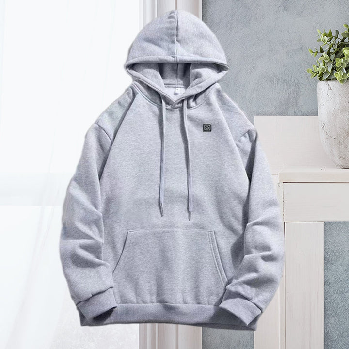 Svart oppvarmet hettegenser til herre i slitesterk polyester, essensielt ytterplagg. [[lstfy-media:6]]